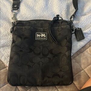 Coach Black Messenger Bag with Utilitarian Design